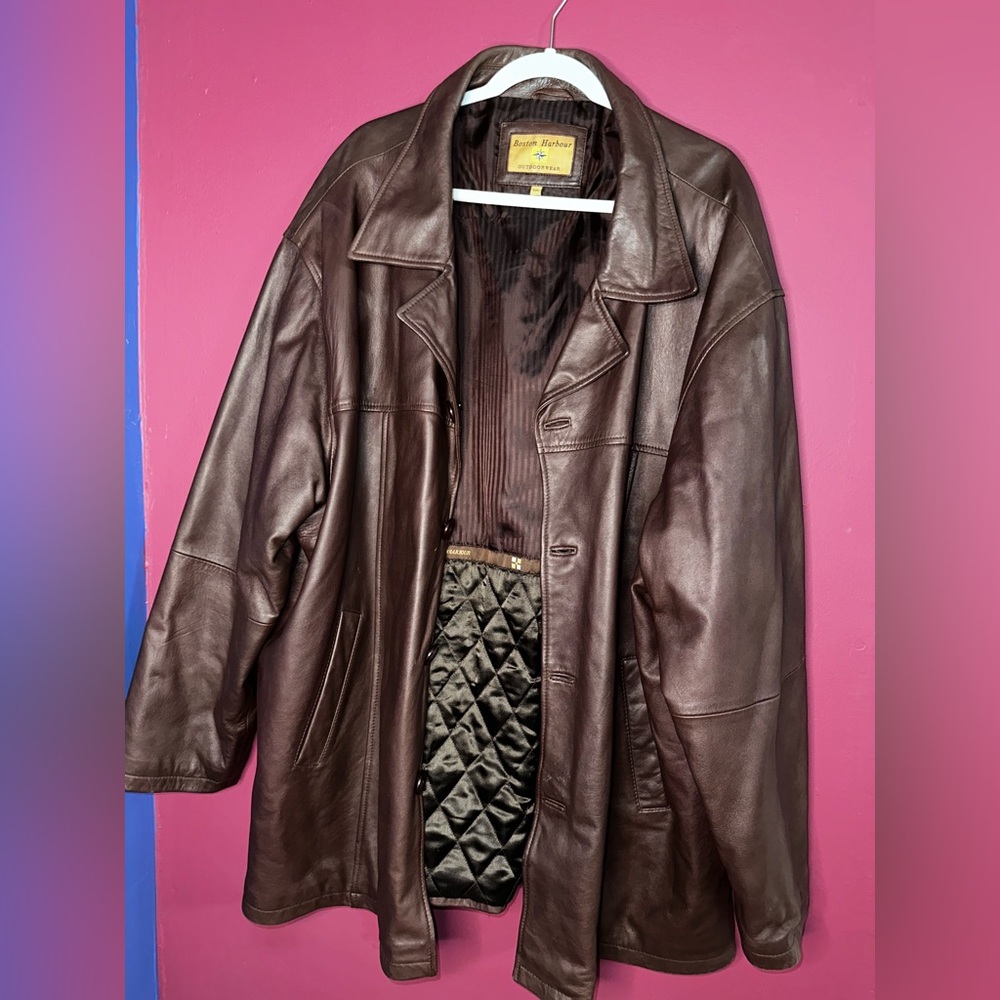 Brown leather jacket with unique diamond patterned lining